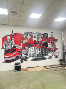 Mural dla Hitachi w Poznaniu – druk ścienny UV 3 × 7 m