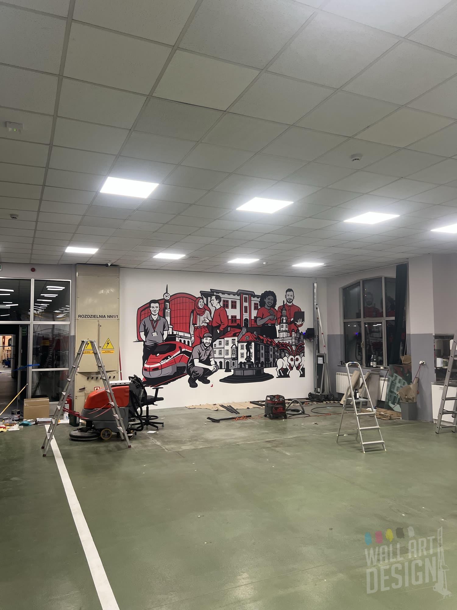 Hala firmy Hitachi w Poznaniu z gotowym muralem 3 × 7 m – druk ścienny UV WallArtDesign